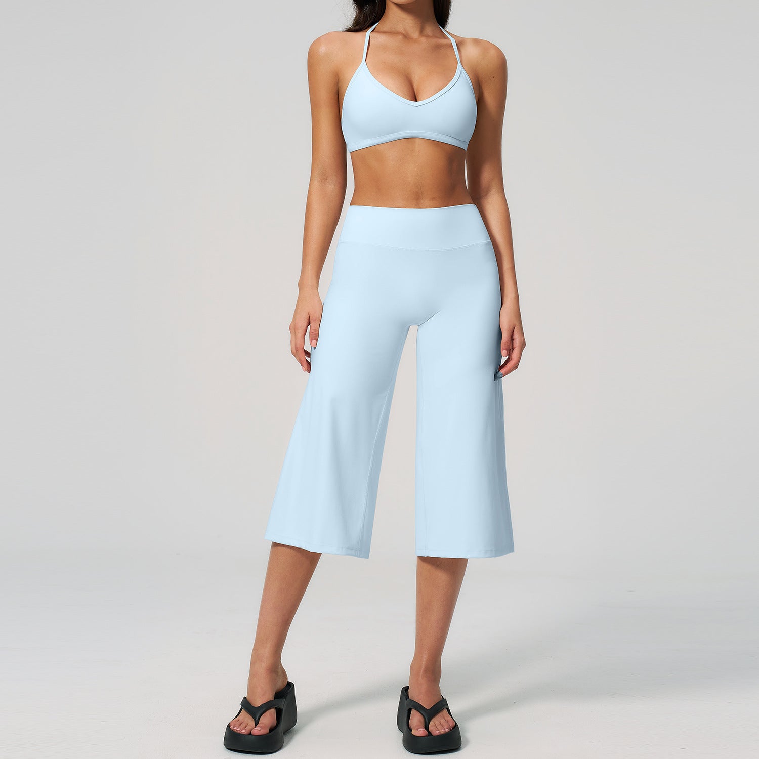 Women's premium-feel sports bra with quick-drying high-waisted mid-length shorts set