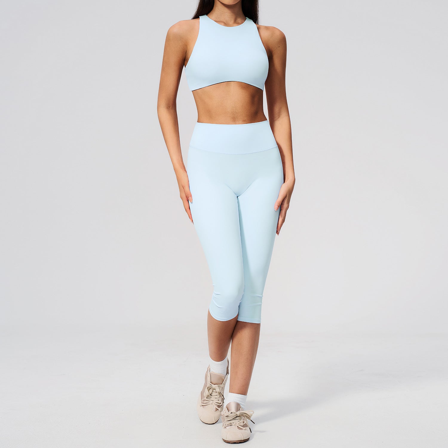 Women's premium-feel sports bra with quick-drying high-waisted mid-length shorts set
